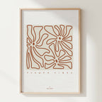 Affiche A4 encadrée, fleurs stylisées au trait terracotta avec texte « FLOWER VIBES »