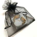Boîte à bijoux en porcelaine dans sachet organza noir, motif doré
