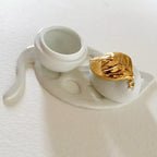 Boîte à bijoux citron : base en porcelaine blanche avec deux renfoncements et capot doré