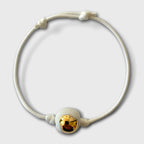 Bracelet cordon blanc avec goutte dorée brillante en porcelaine