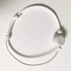 Bracelet cordon blanc avec perle ronde blanche en porcelaine