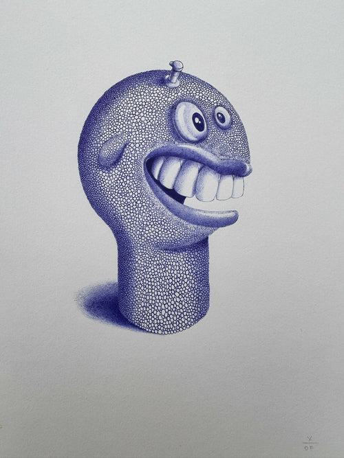 Figurine tête de monstre bleue à dents, yeux ronds et petit bouton antenne