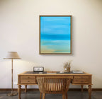Tableau bleu lagon avec horizon et vagues stylisées, cadre bois clair.