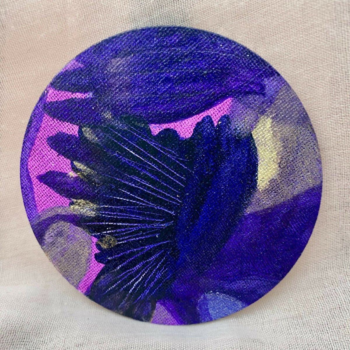 Encre liquide « Luz » en bouchon rond : motif abstrait bleu et violet, éclaboussures.