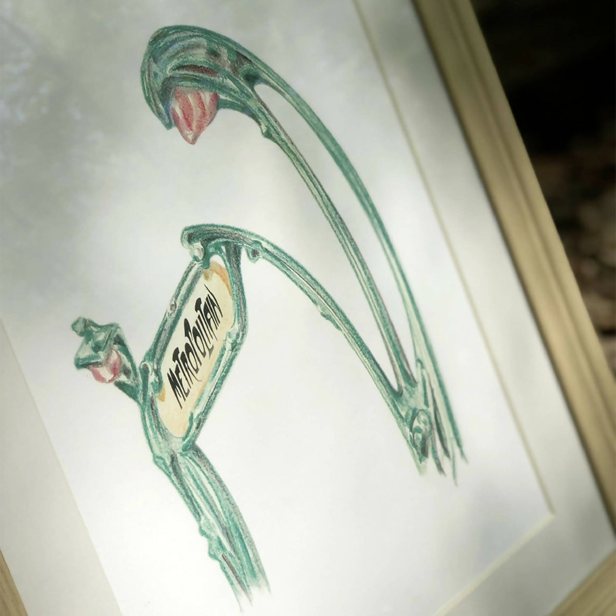 Affiche encadrée « Métropolitain » : détail du motif vert, fond clair