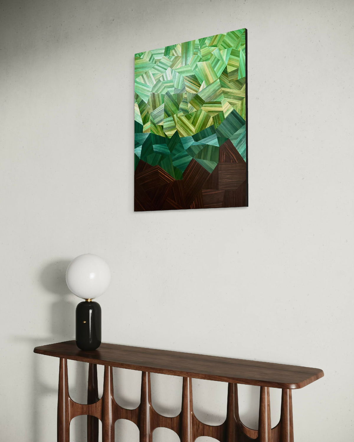 Tableau décoratif vert avec relief de cubes, base brun foncé, cadre noir.
