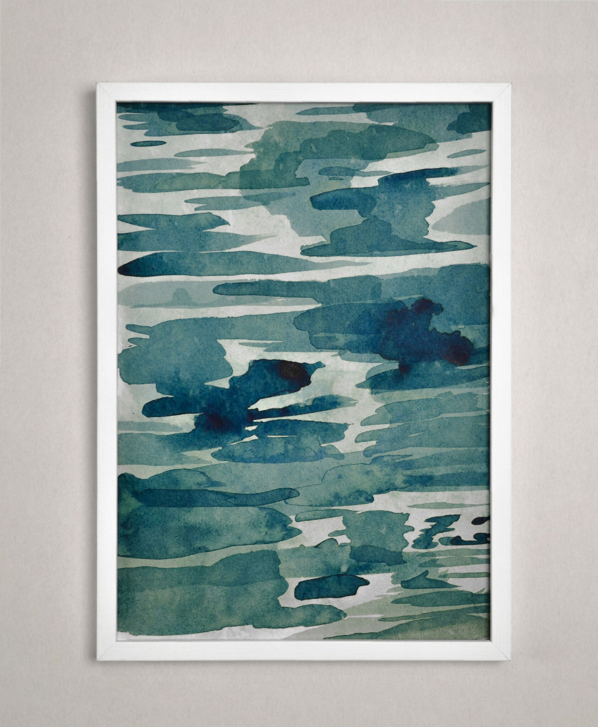 Affiche encadrée bleu-vert avec taches et bandes abstraites, cadre blanc