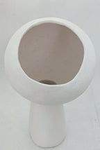 Lampe à poser design blanche, vue de dessus avec ouverture circulaire