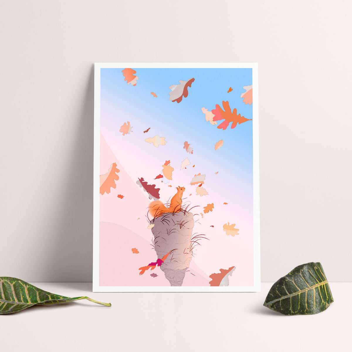 Affiche murale avec chat gris lancé dans une pluie de feuilles orange sur fond bleu.