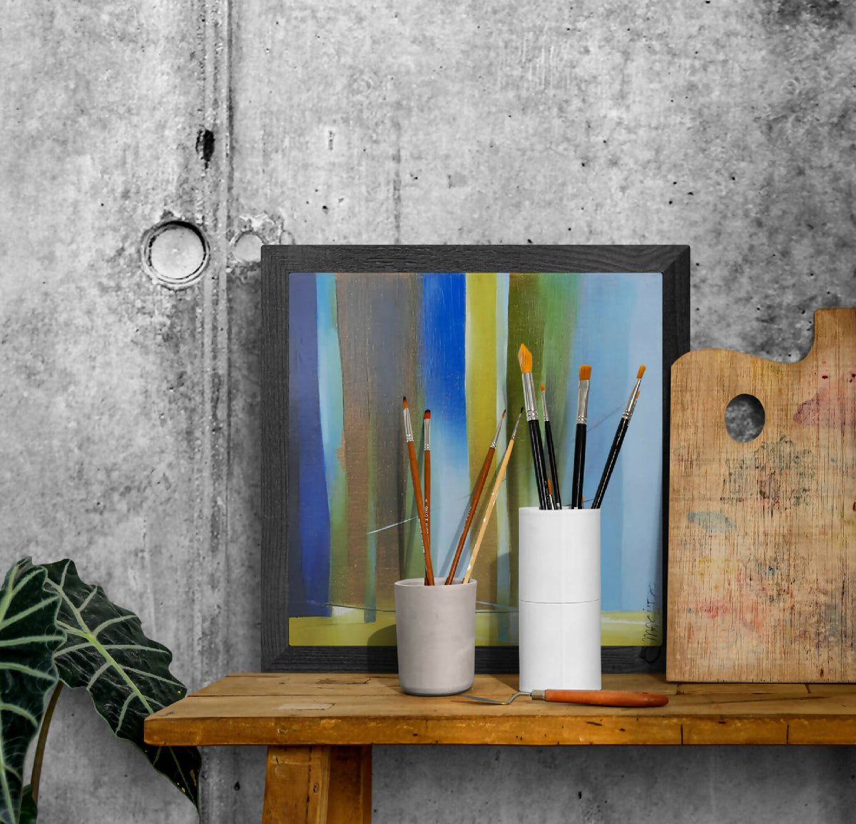 Tableau abstrait encadré, colonnes colorées bleu, vert et jaune