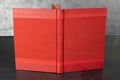 Carnet ou livre d’or rouge monochrome, couverture rigide et tranche centrale visible