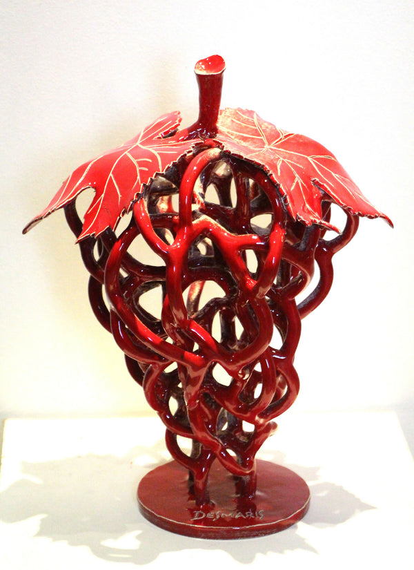 Décoration métallique rouge et noire, forme abstraite avec grappe