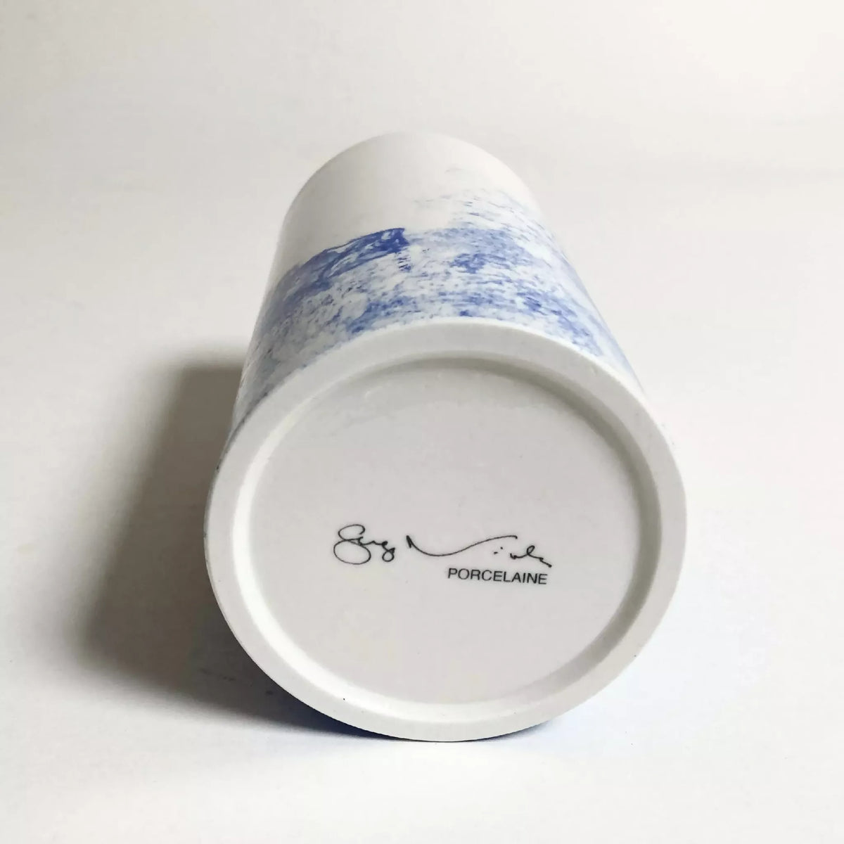 Base de petit vase en porcelaine blanche avec marquage "PORCELAINE"