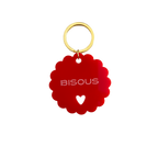 Porte-clés fleur rouge BISOUS, anneau doré et petit cœur en relief