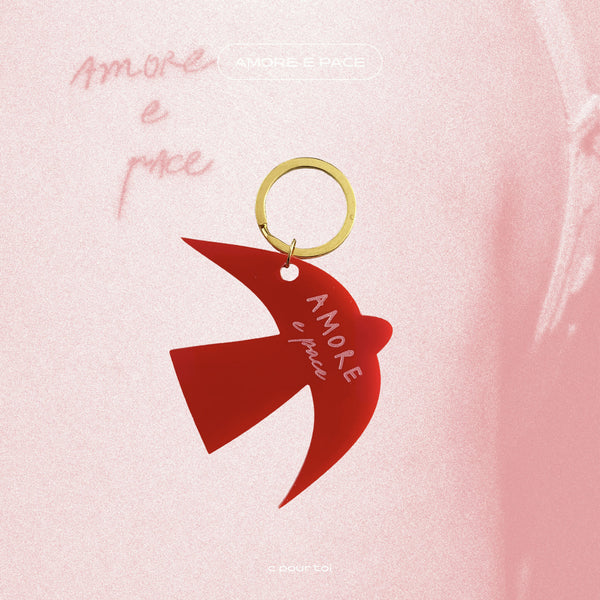 Porte-clés rouge «AMORE E PACE» avec anneau doré, cœur ajouré