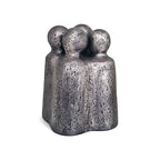 Sculpture contemporaine en métal gris foncé, trois figures rondes réunies
