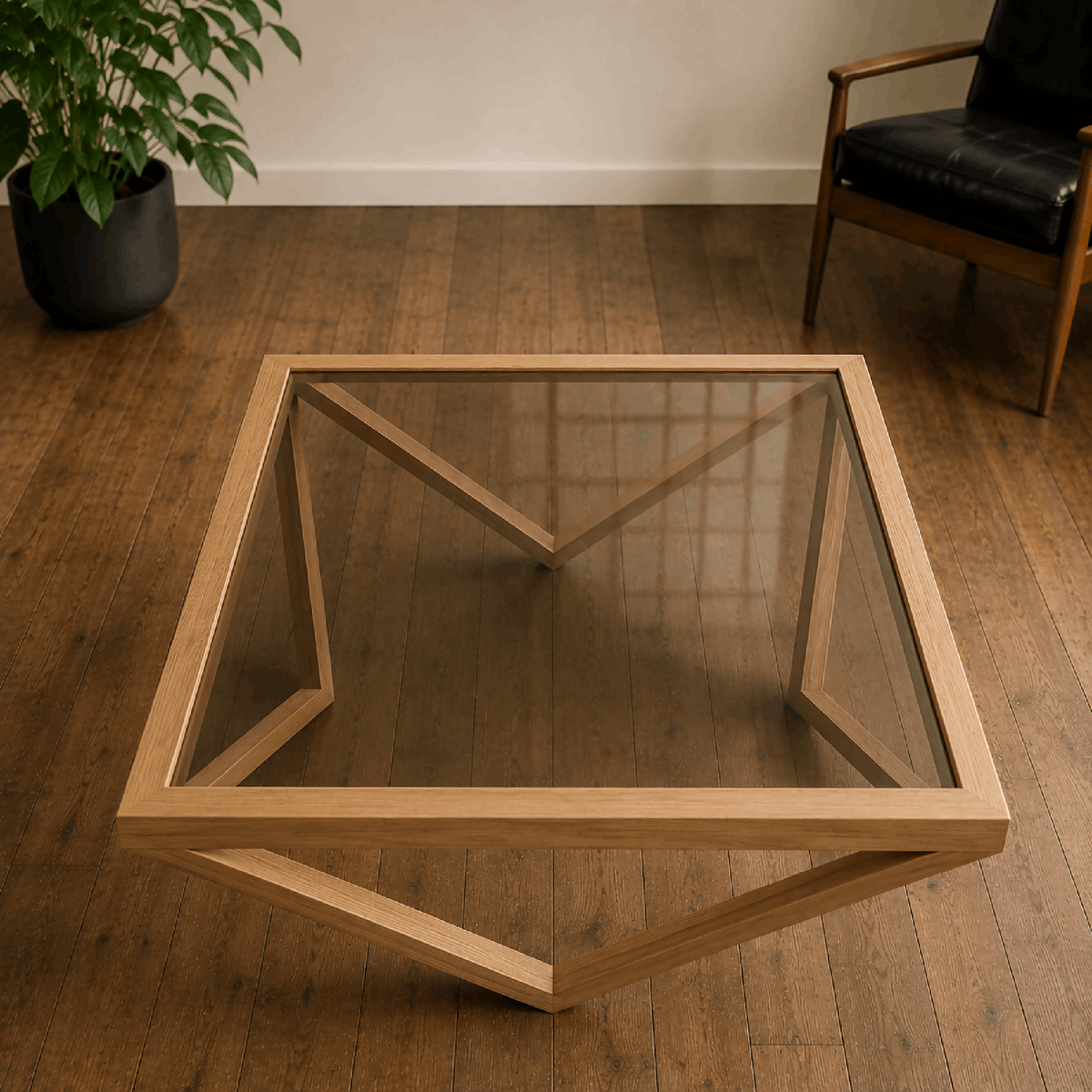 Table basse en bois clair et plateau en verre, vue dessus avec structure en X