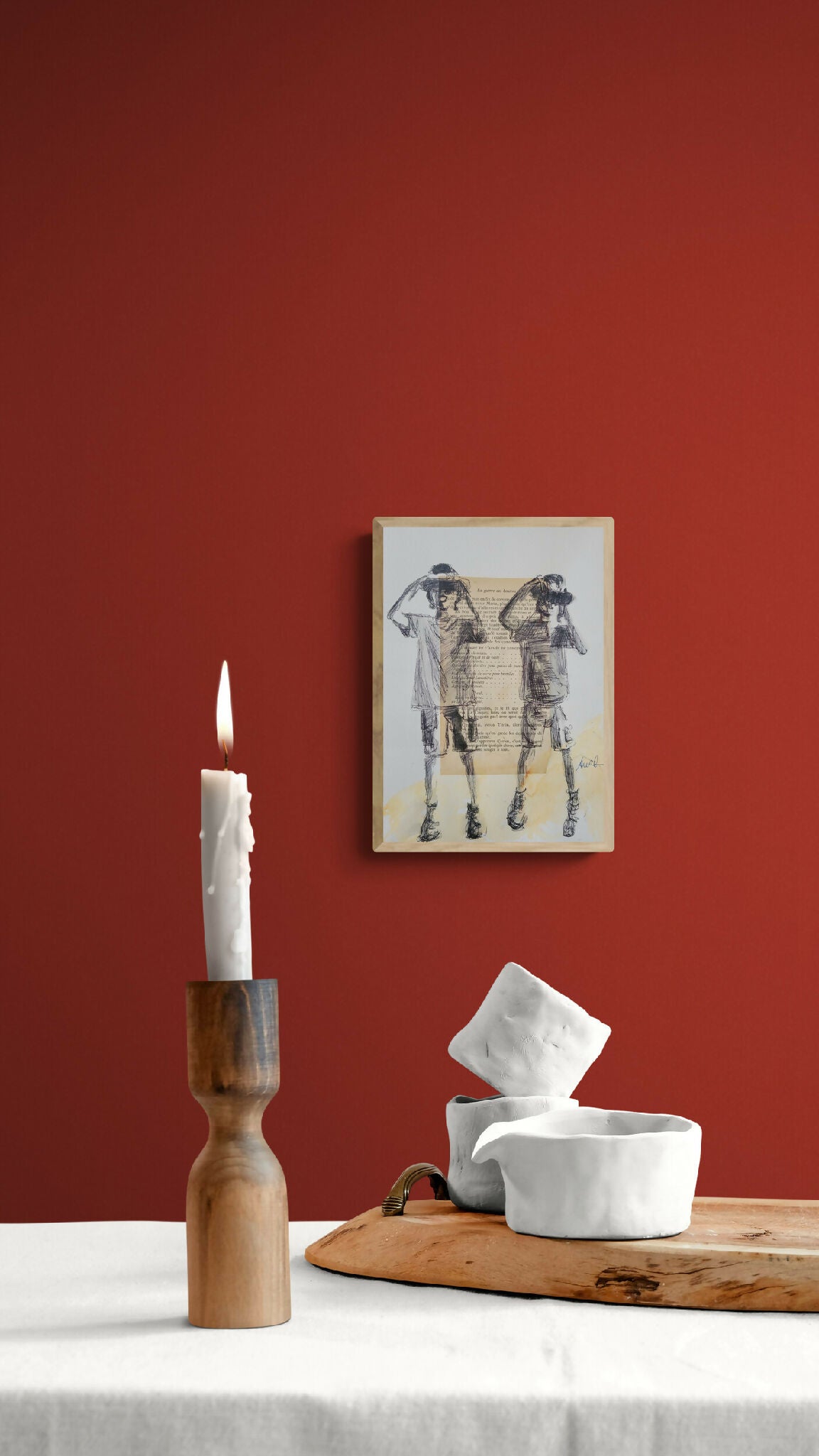 Tableau encadré « Les jumelles » : deux personnages en uniforme, style illustration.