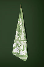 Torchon imprimé vert et blanc, plié et suspendu, tissu texturé