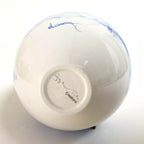 Base intérieure de vase blanc avec logo Creators