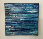 Tableau peinture abstraite sur toile, bleu nuit avec touches turquoise et blanches.