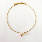 Collier fin à chaîne dorée avec pendentif rond