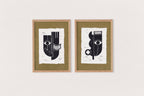 Deux gravures abstraites noir et blanc, encadrées, visages stylisés
