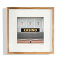 Décor mural encadré Casino avec affiche noire et trois chiffres 7.