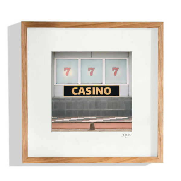 Décor mural encadré Casino avec affiche noire et trois chiffres 7.